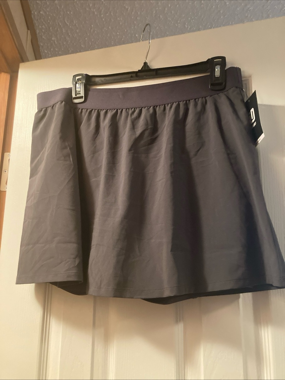 Ideology Performance Skort in Charcoal Black